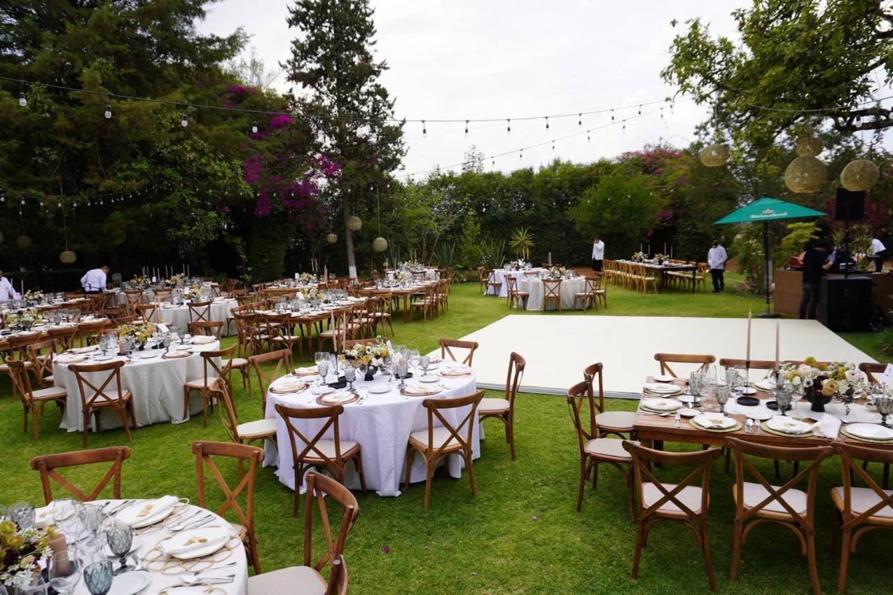 Best Western Plus Posada De Don Vasco Patzcuaro Exterior photo A wedding reception at the garden of the Quinta de Olivella